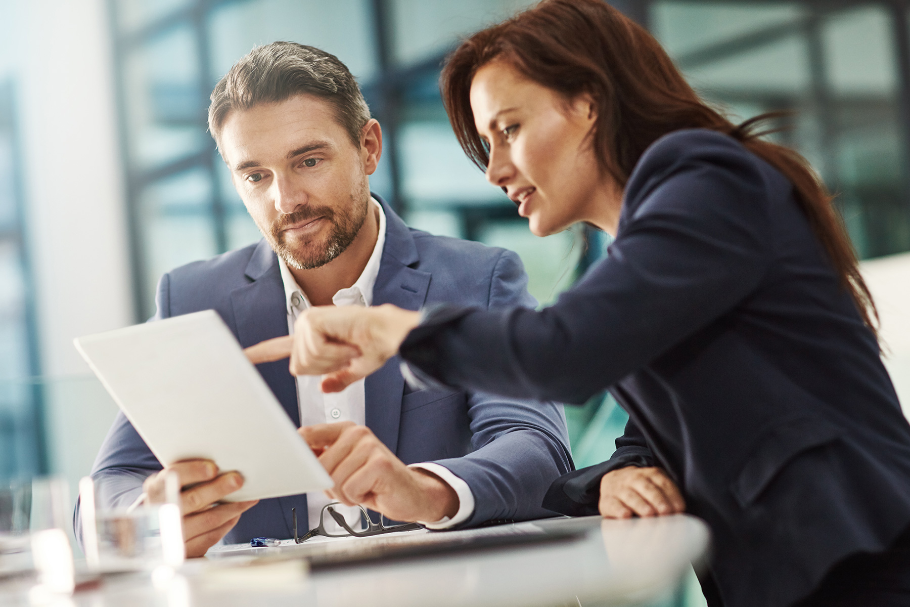 Two business people reviewing documents.
